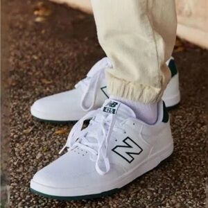 New Balance White Sneakers with Green Accents
